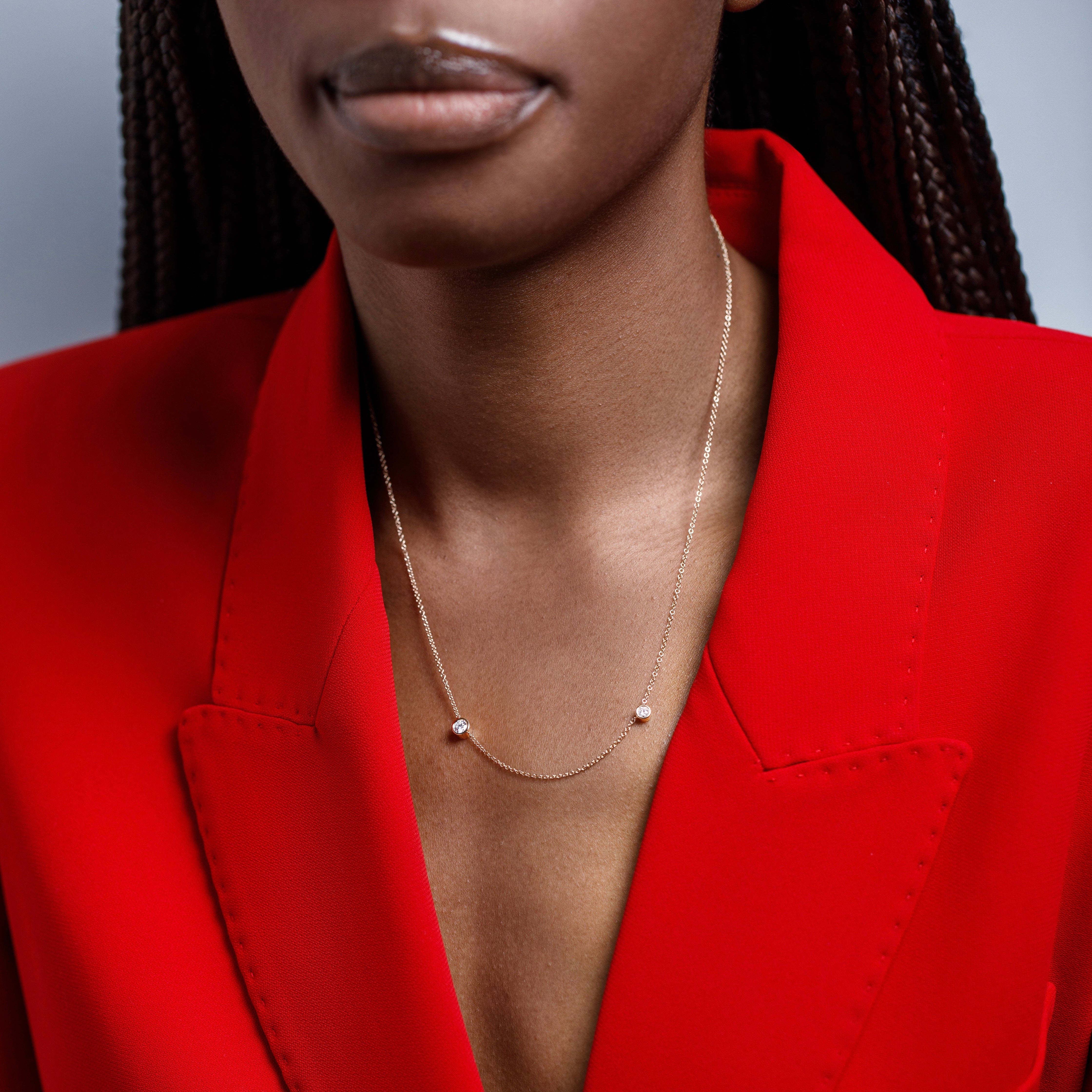 Modern necklace with delicate chain and asymmetrical lab created white diamonds in 14 karat gold by SHW best fine jewelry store in NYC