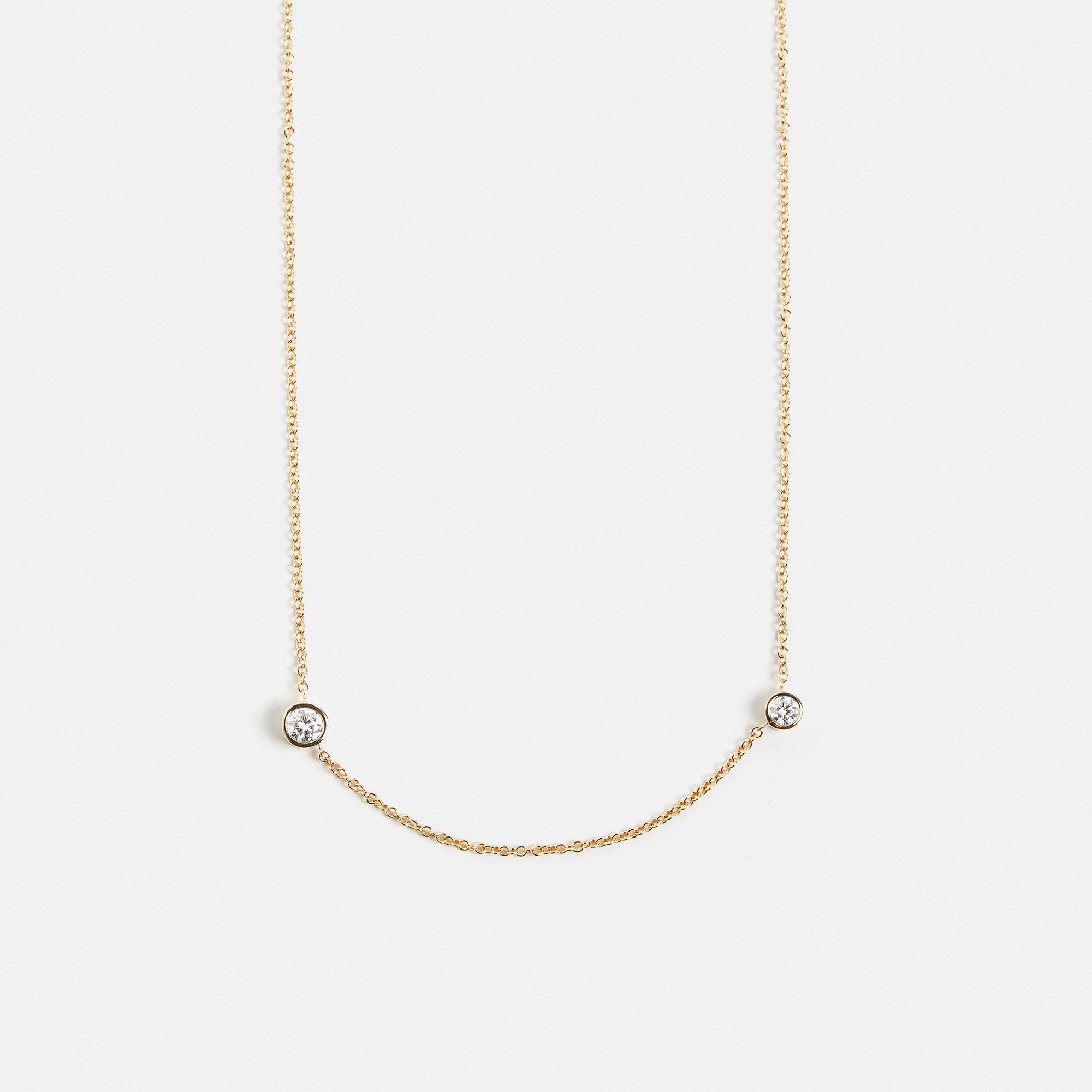 Unique necklace with dainty chain and asymmetrical lab grown white diamonds in solid 14k gold by SHW cool fine jewelry stores in NYC nearby