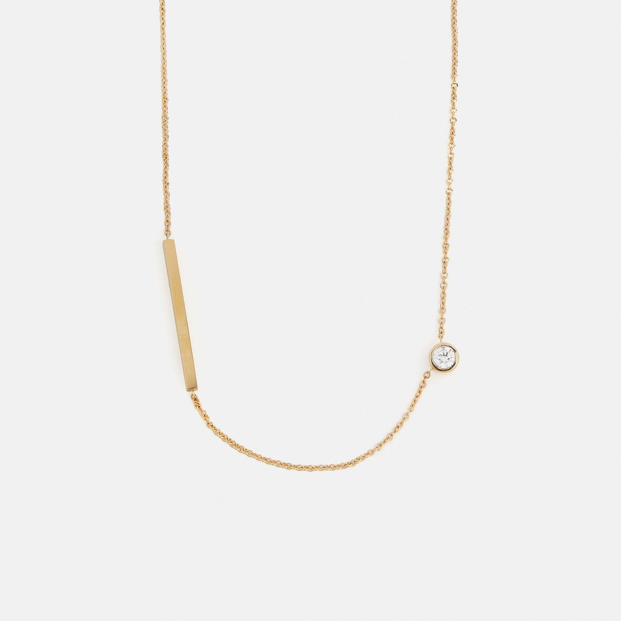 Unique necklace with dainty chain and asymmetrical lab grown white diamond in solid 14k gold by SHW cool fine jewelry store in NYC nearby