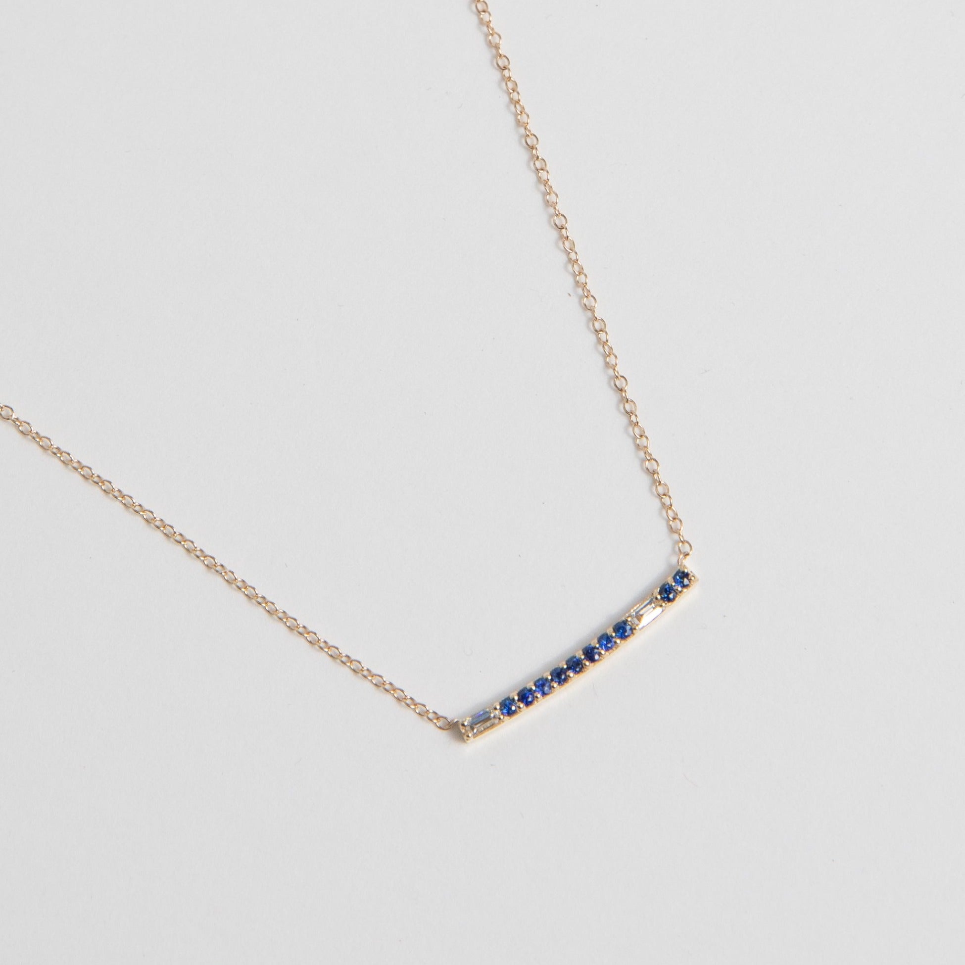 Unique Les Necklace in 14k yellow gold with precious sapphire gemstones and princess cut white diamond made in NYC by SHW fine Jewelry