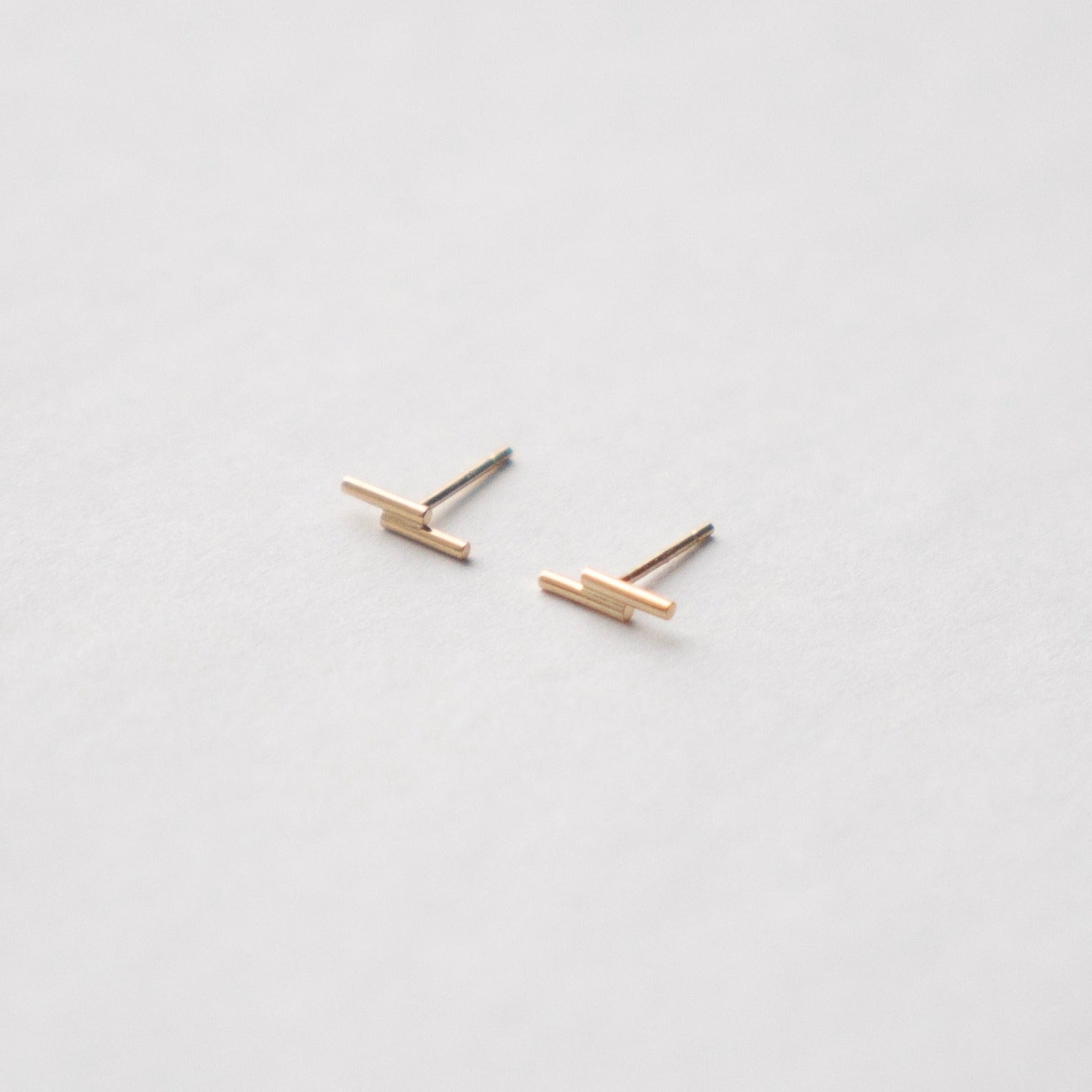 Cool Billy Stud Earrings in 14k yellow gold lightning bolt bar stud earrings by SHW Jewelry NYC