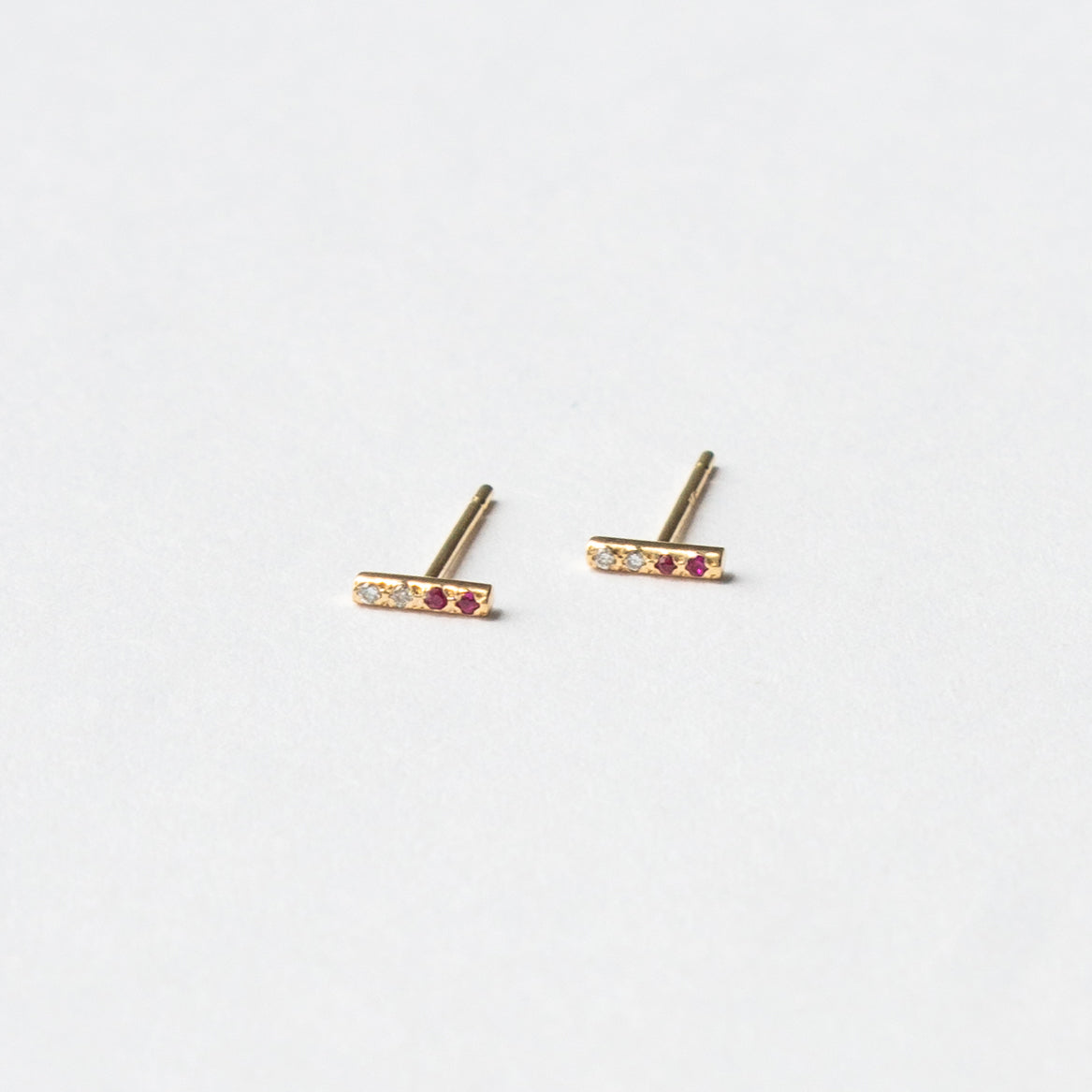 Vivi designer earrings in 14 karat recylcled Gold set with precious ruby gemstones made in NYC by SHW fine Jewelry