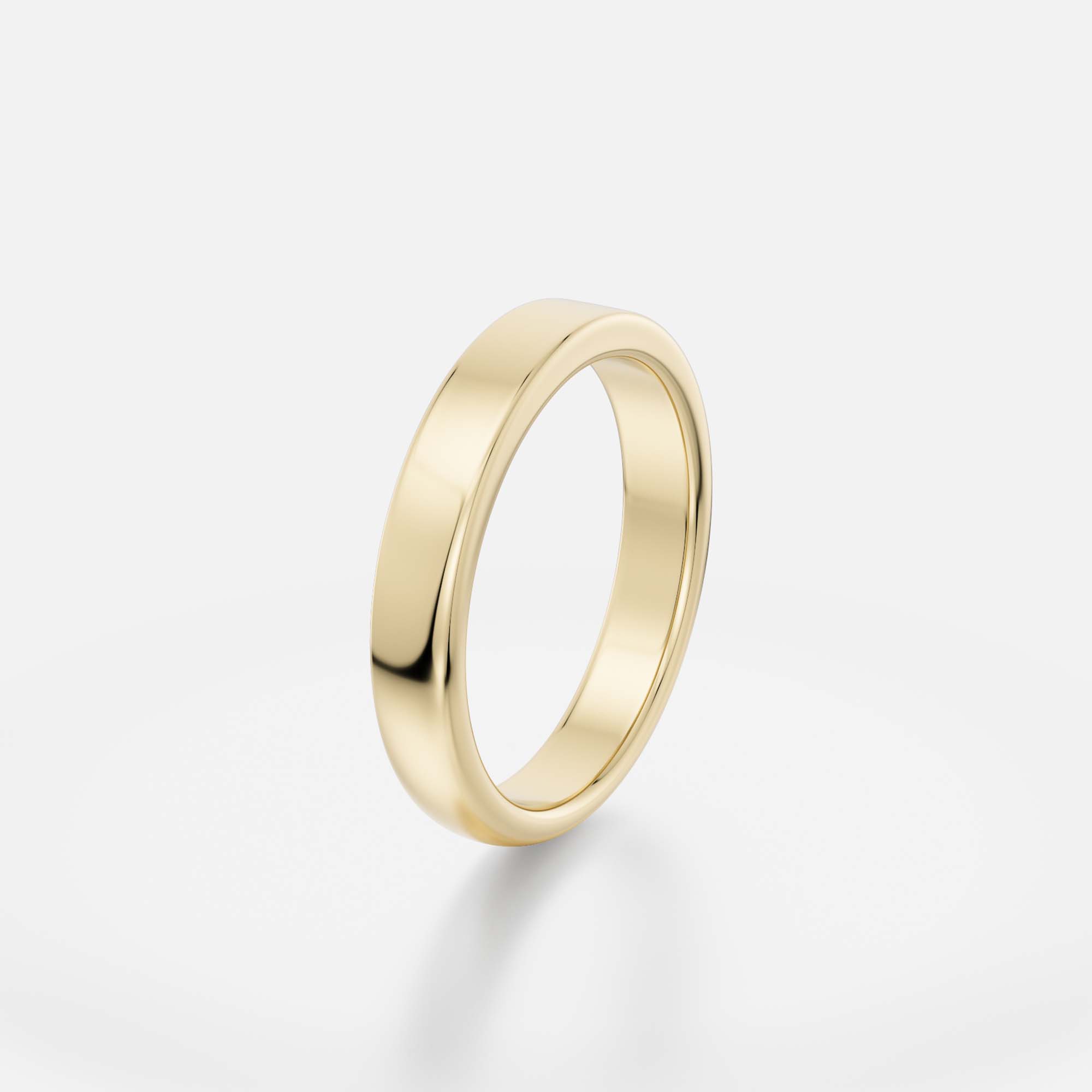 Gold band showing contrast between flat plane and domed curve