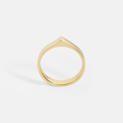 4mm architectural gold band with pointed peak viewed at an angle