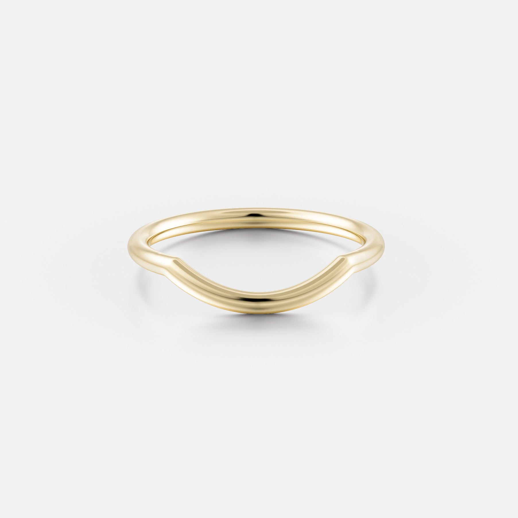 14k yellow gold curved wedding band with a slim rounded profile