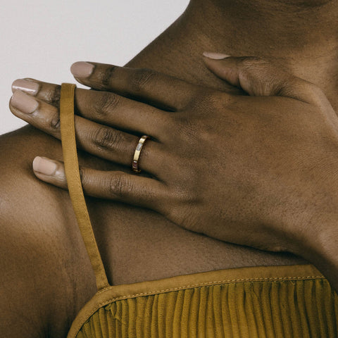 3mm flat baguette diamond band shown worn in natural light