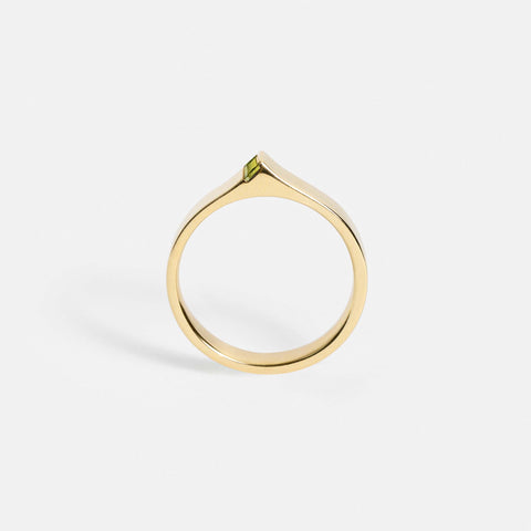 Contemporary solid gold ring with 4mm flat band and peridot gemstone, bold sculptural SHW jewelry NYC