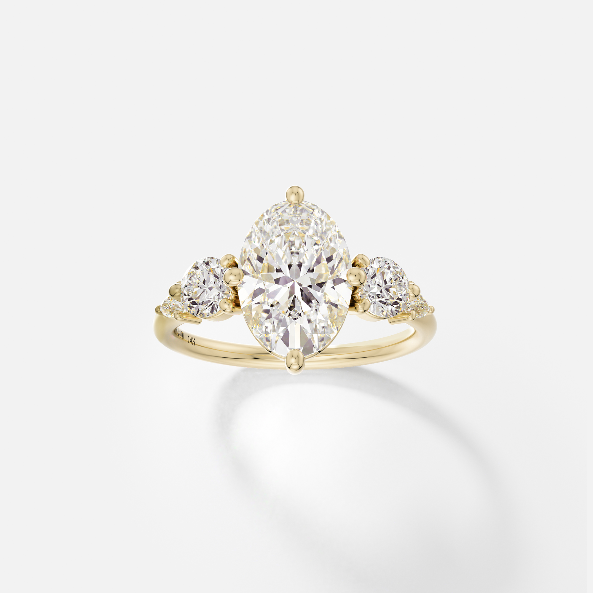 Gija oval five stone diamond cluster engagement ring front view in 14k yellow gold