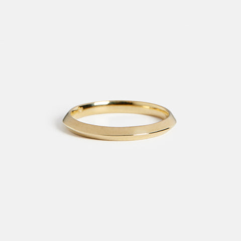 14k yellow gold 2mm knife edge wedding band with a sharp center ridge