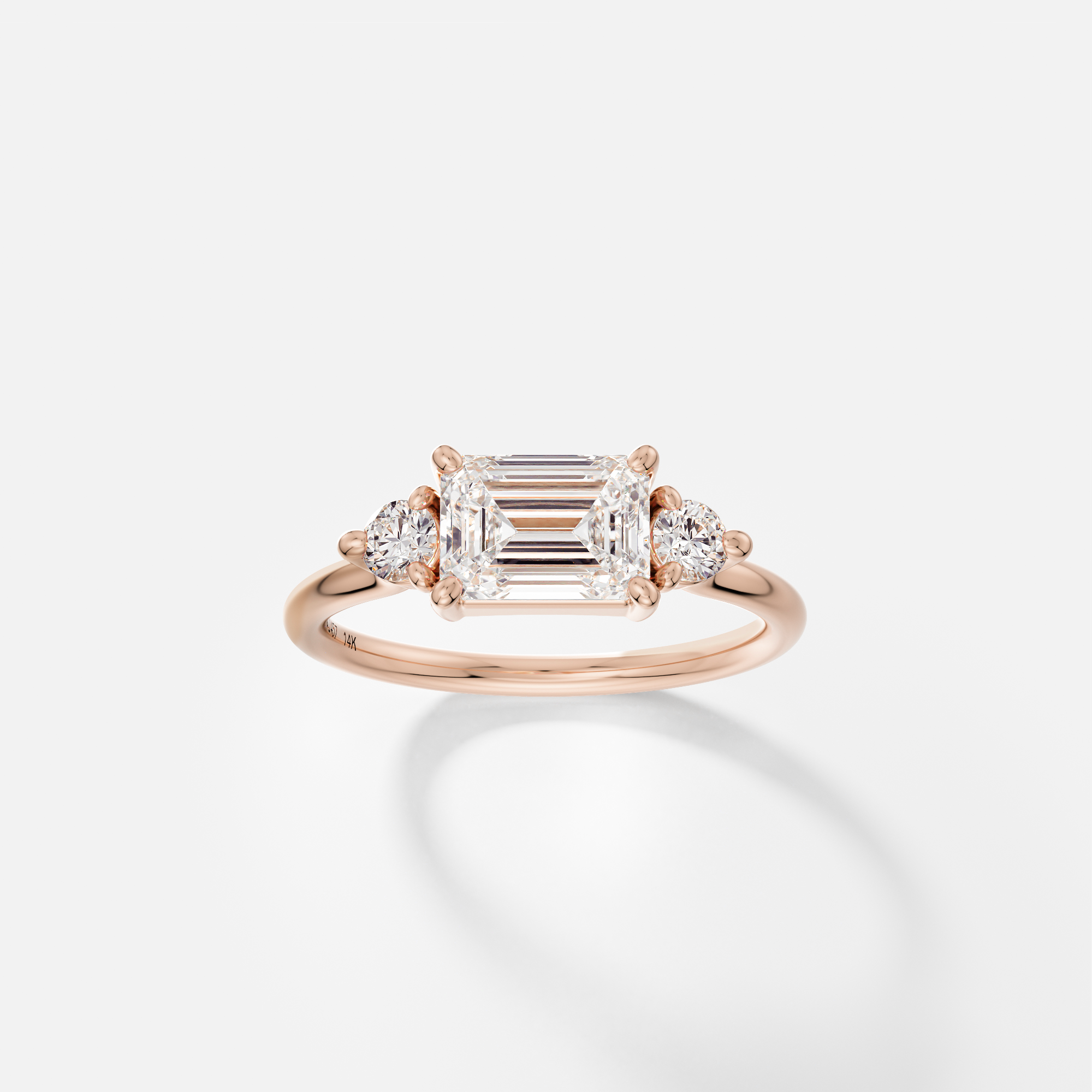 Kala emerald cut diamond cluster engagement ring front view in 14k rose gold