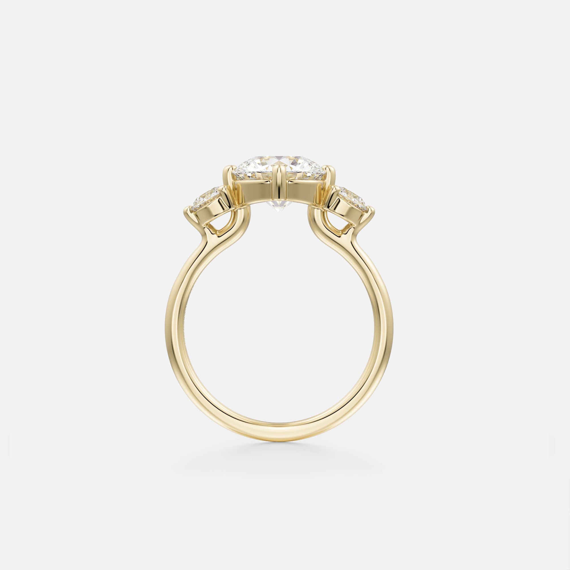 14 karat yellow gold engagement ring with round brilliant diamond center and round accent stones in prong setting