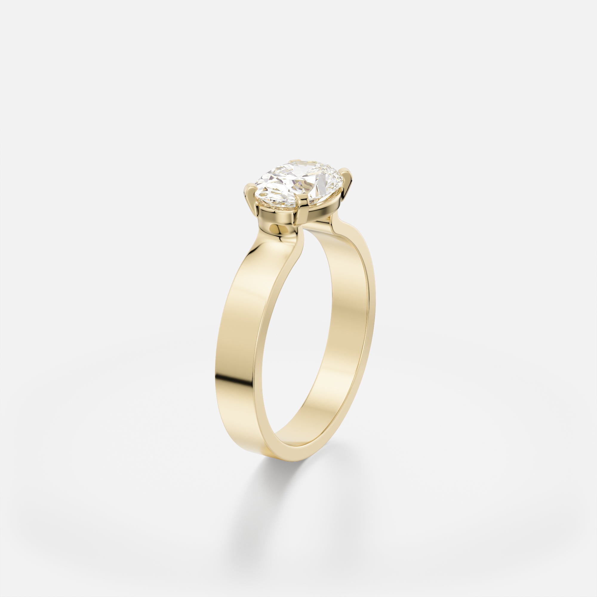 Sculptural flat band engagement ring with 1.5 ct oval diamond set east west in delicate corner prongs