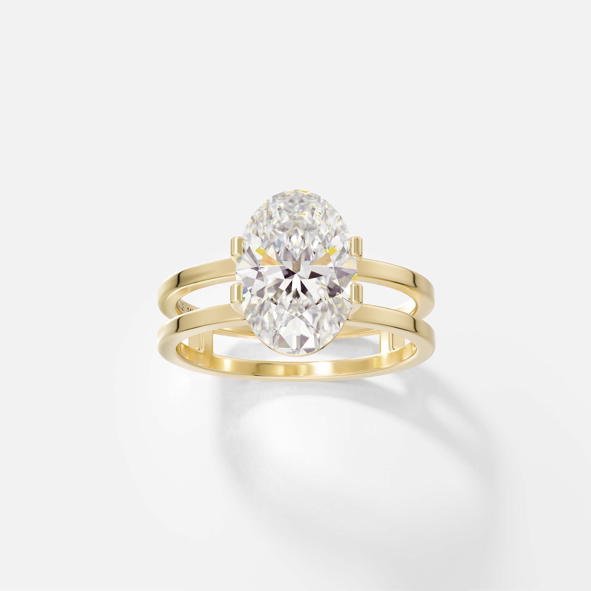 14k yellow gold open double band engagement ring with 2 carat oval diamond set north south