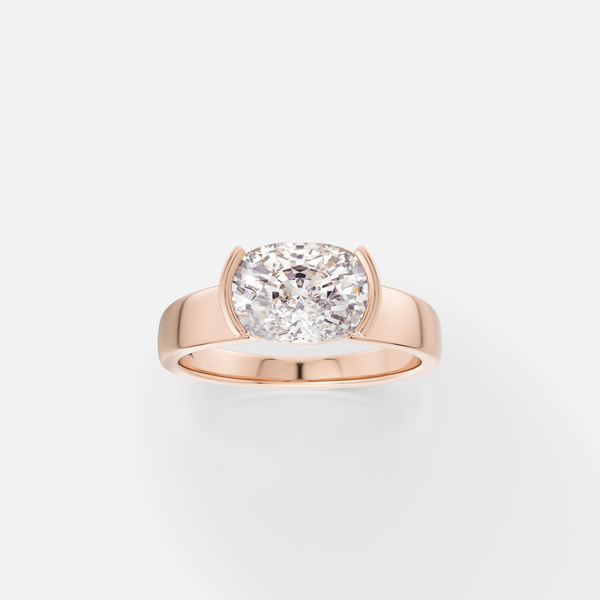 14k rose gold engagement ring with 2 carat east-west cushion-cut diamond set in tapered partial bezel