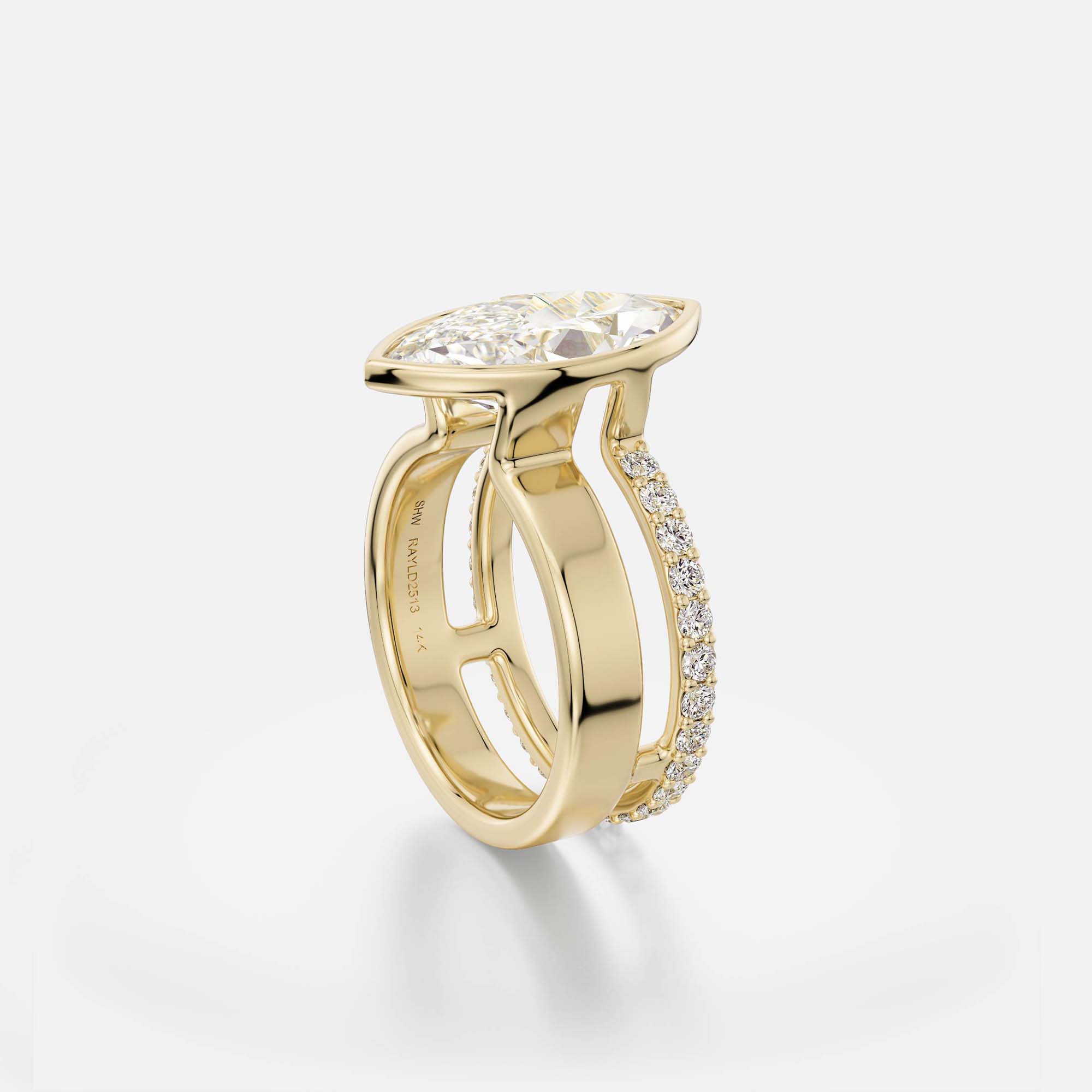 4 carat marquise-cut diamond engagement ring with bezel setting and pavé diamond eternity band on sculptural double band