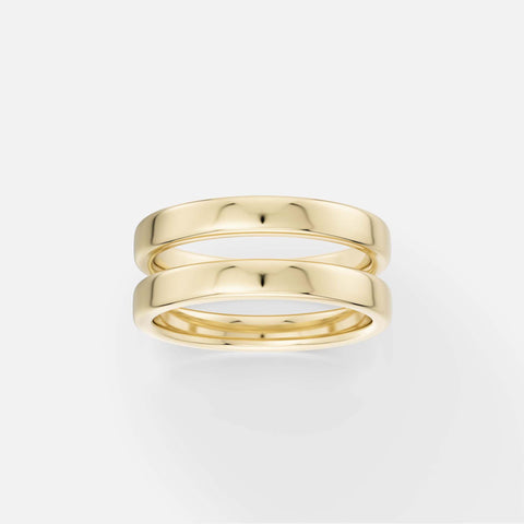 14k yellow gold double band wedding ring with a sculptural stacked design