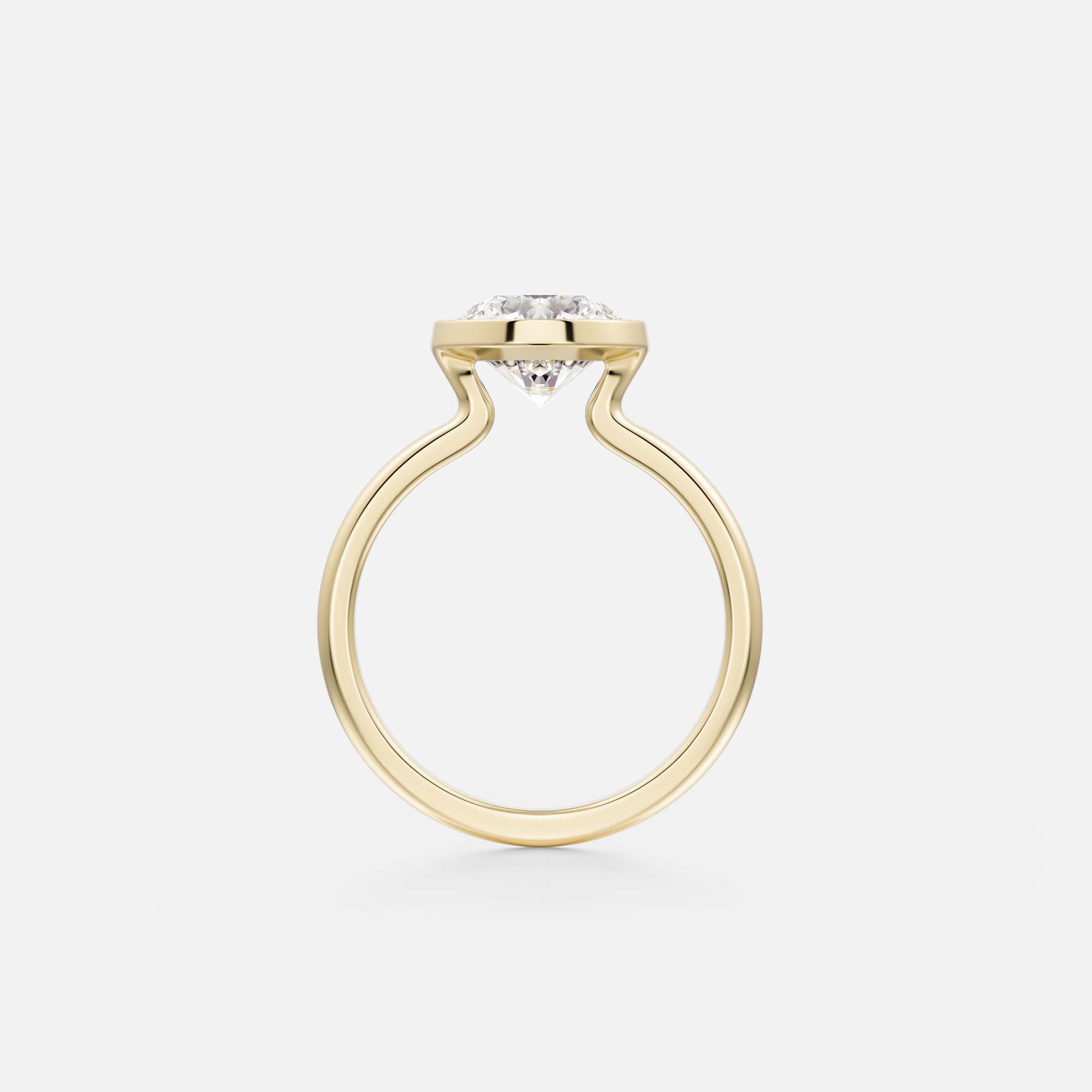side view of 2.0 carat round brilliant-cut diamond bezel engagement ring on slender 2mm domed gold band