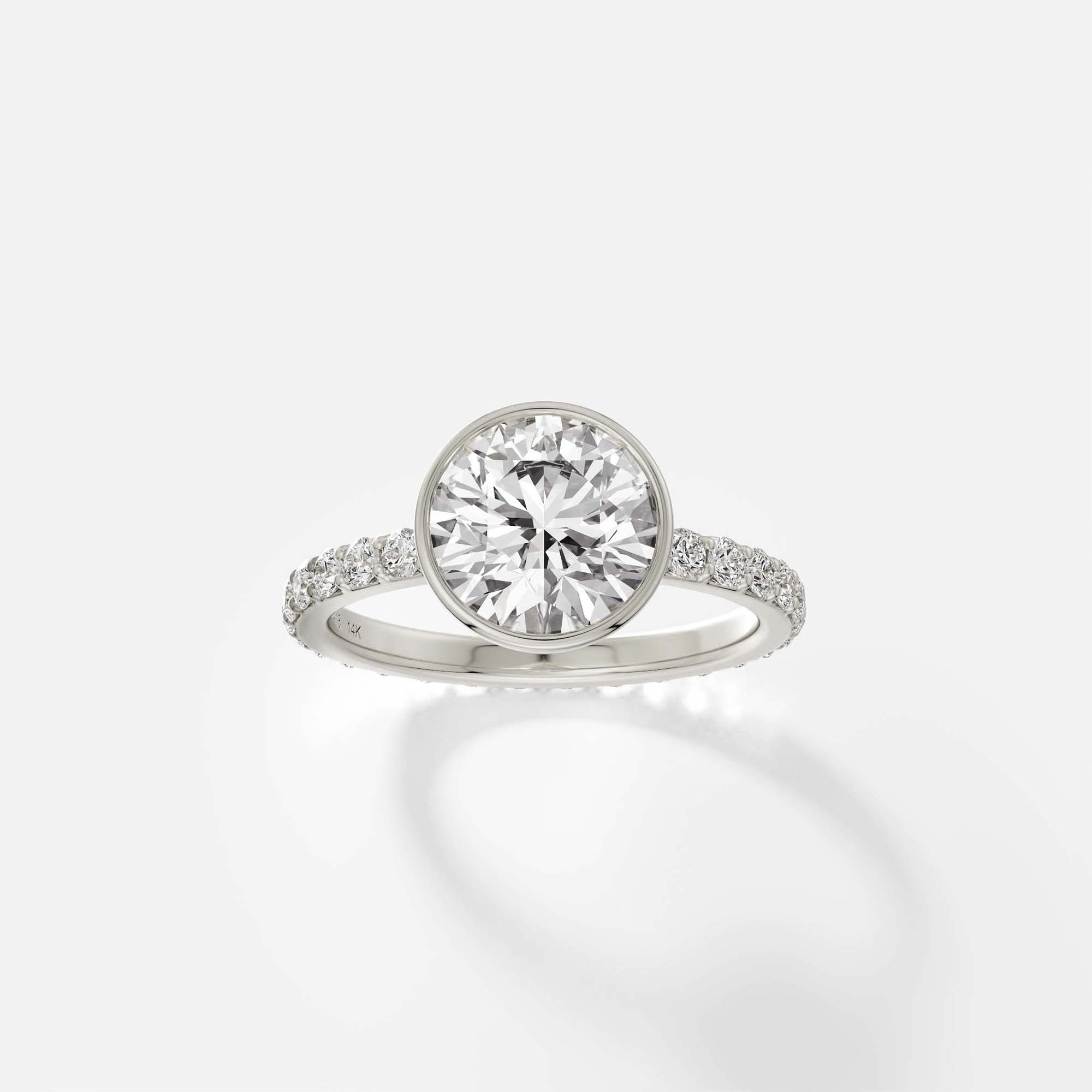 Tulpe bezel diamond engagement ring with pavé band front view in 14k white
