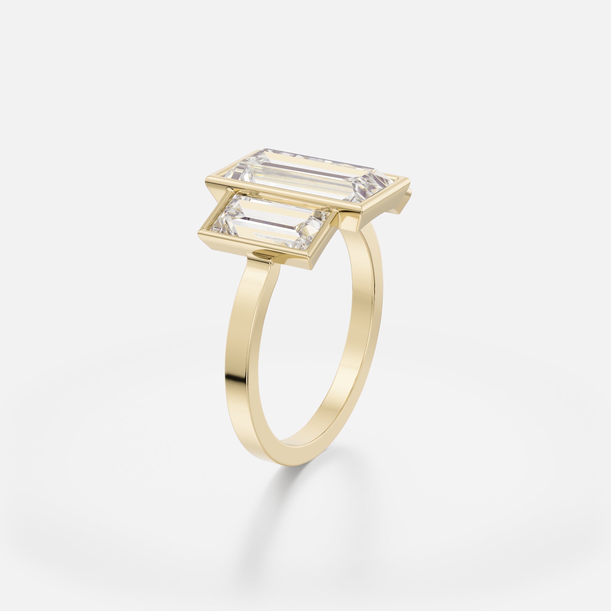 Modern three stone engagement ring with baguette-cut center diamond and side stones in open setting on flat band