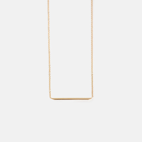 Designer necklace with dainty chain and simple geometric pendant in solid 14k gold by SHW cool fine jewelry stores Soho East Village NYC