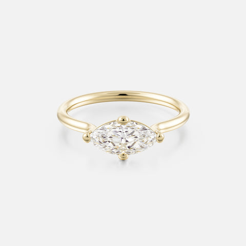 14k yellow gold engagement ring with 1 carat east-west marquise diamond on thin round profile band with compass prongs