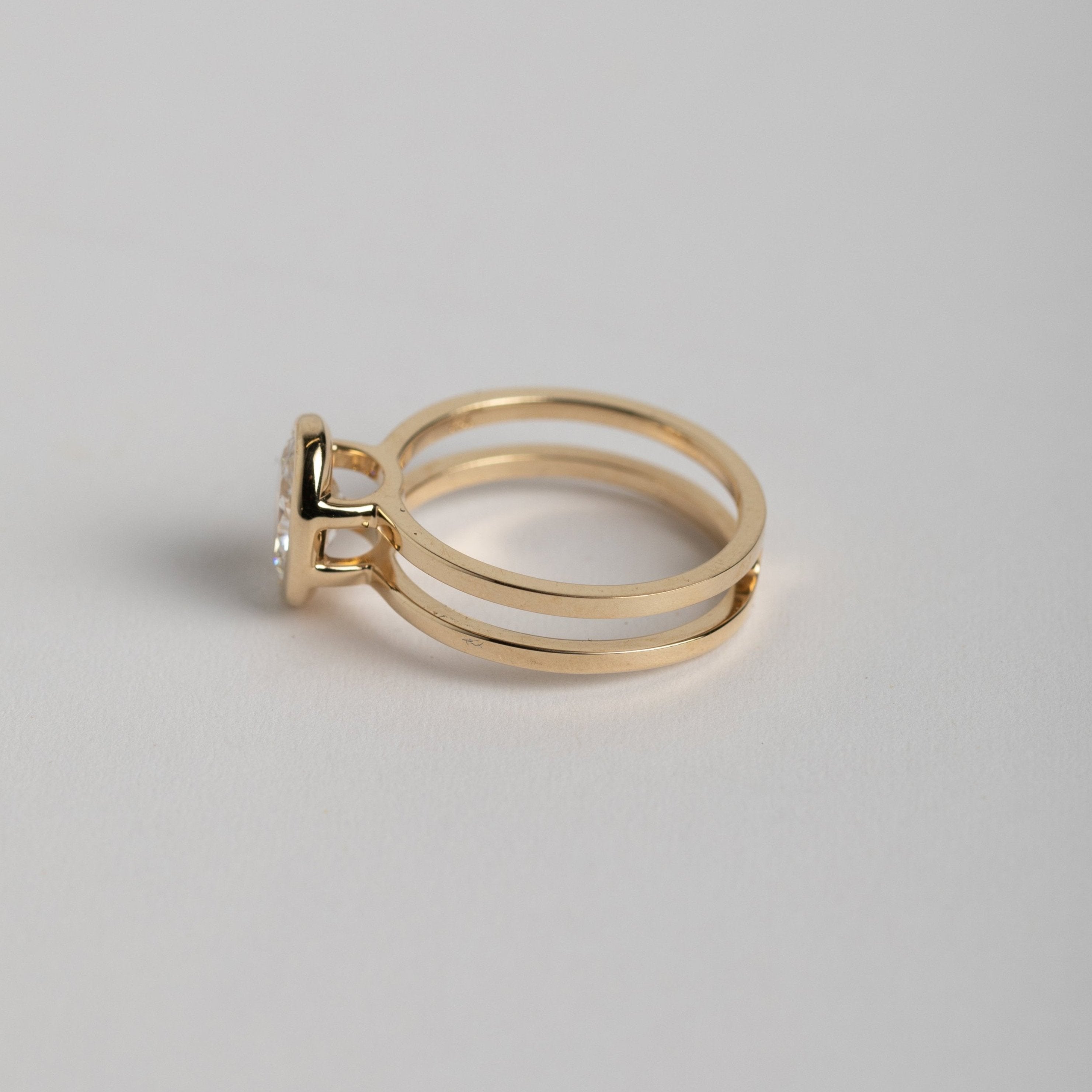 Minimalist Double Band Engagement Ring with 1ct oval lab-grown diamond in 14karat yellow gold by SHW coolest fine jewelry store in NYC nearby