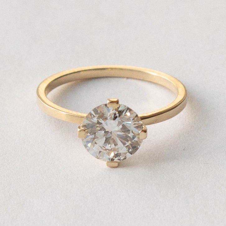 Minimalist Thin Band Engagement Ring with 1.5ct  lab-grown fabricated diamond in 14 karat yellow gold by SHW fine jewelry store in LES NYC