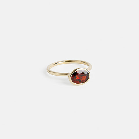 Lida Minimalist Ring in 14k Gold set with an oval cut garnet By SHW Fine Jewelry NYC