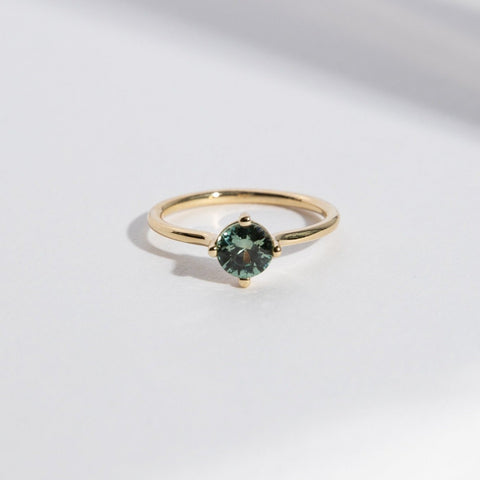 Velu Designer Ring in 14k Gold set with a 0.8ct round brilliant cut green sapphire By SHW Fine Jewelry NYC